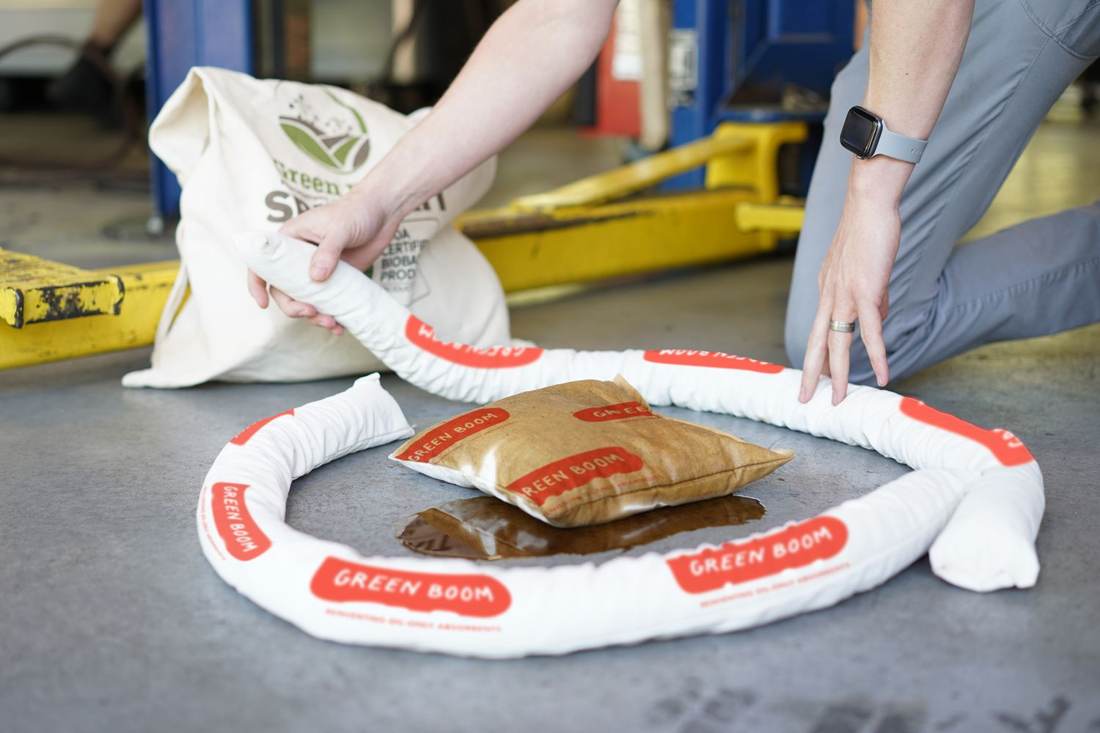 Green Boom absorbents in automotive repair use